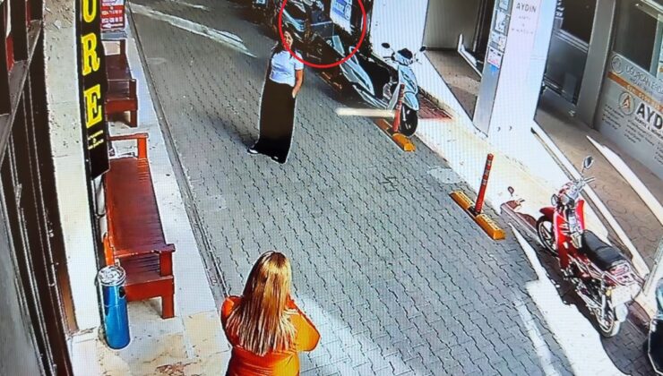 Silifke’de iş hanından kopan cam, sohbet eden kadının yanına düştü! O anlar kamerada